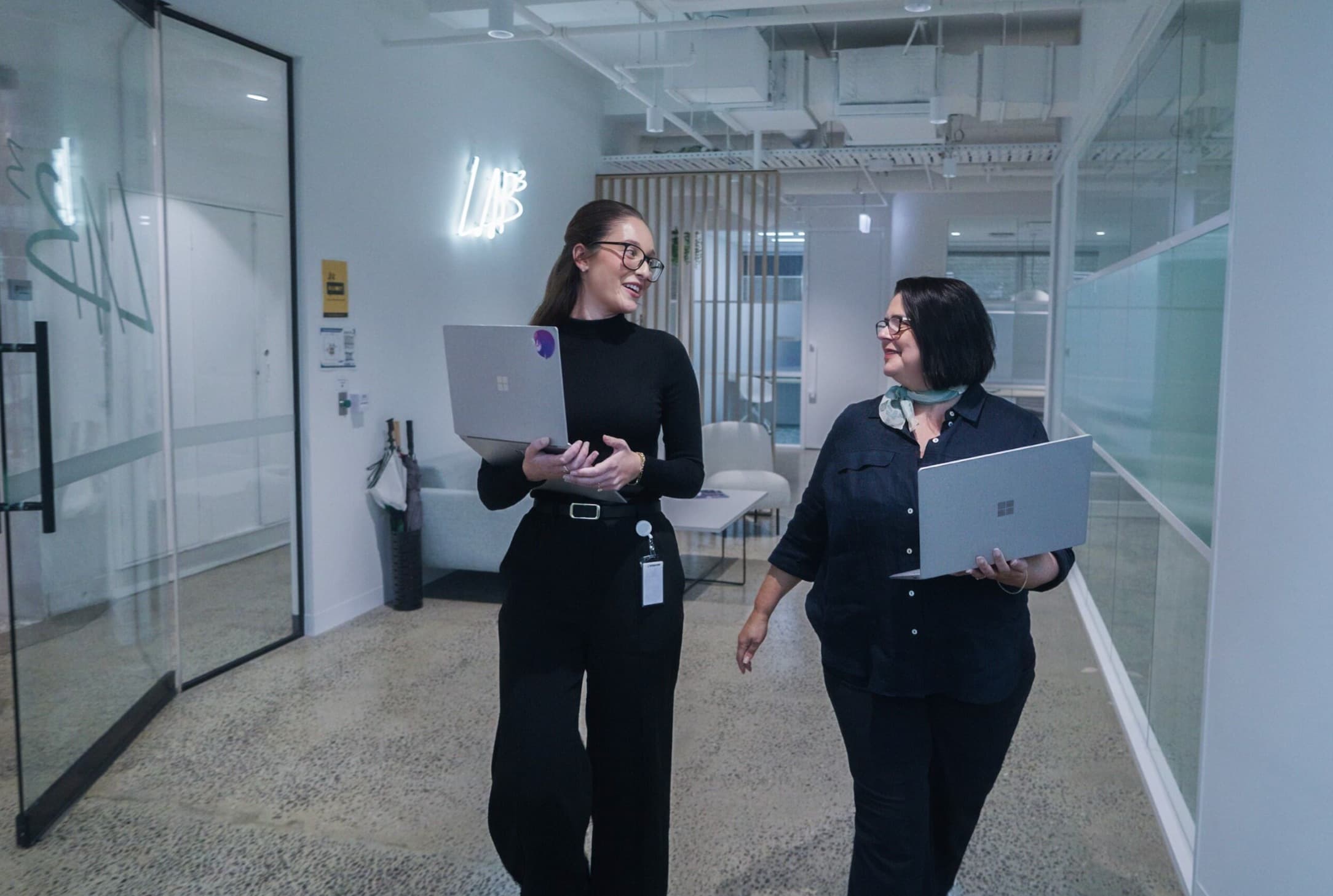 LAB3 team members collaborating in a modern office